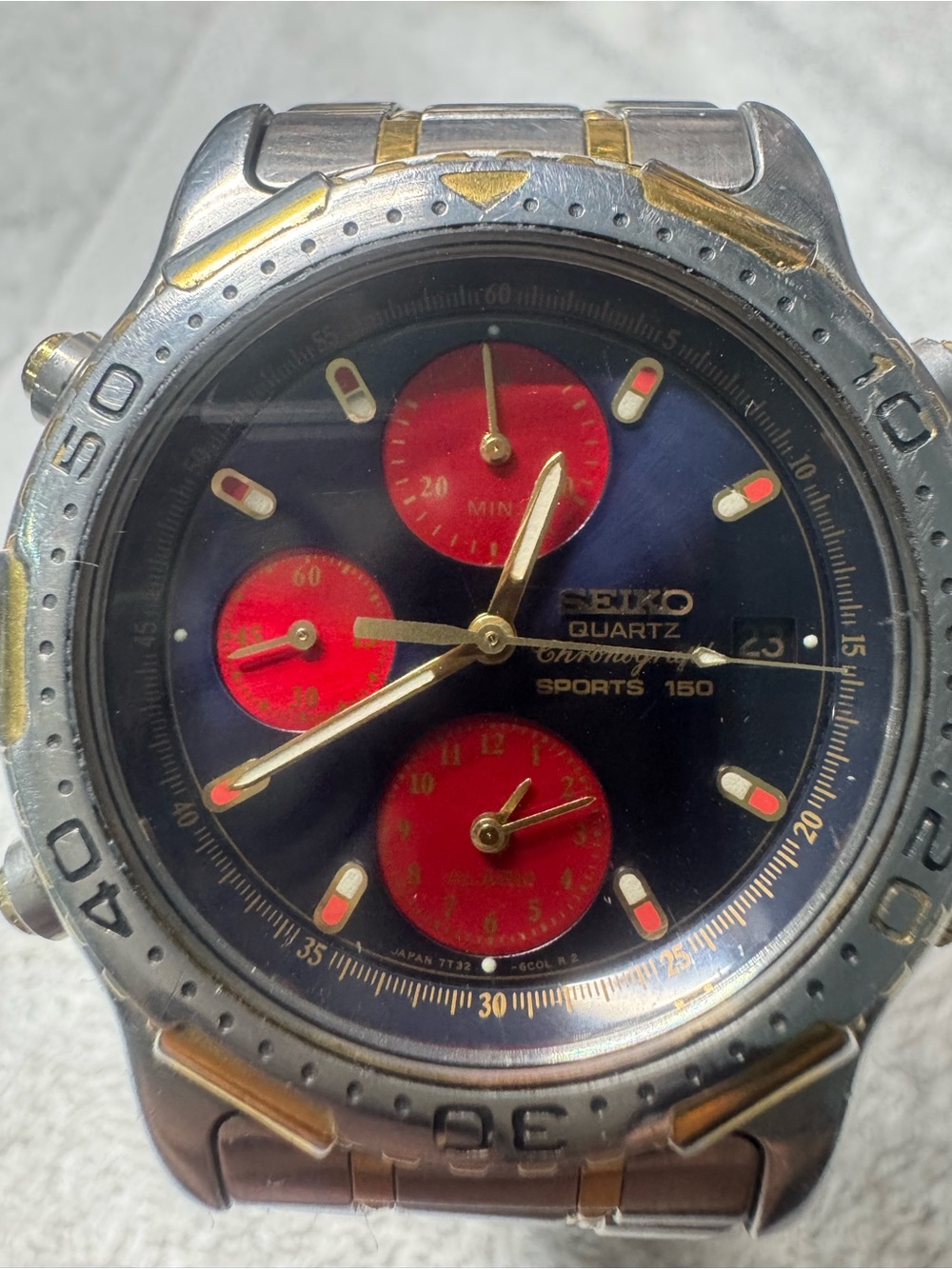 Seiko Navy Dial Chronograph with Red Subdials and Gold Accents